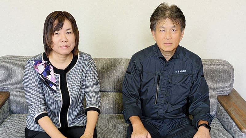 山本建設株式会社の社員2名の写真